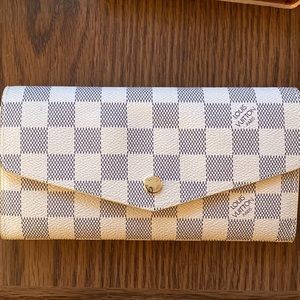 LV wallet - only reason I’m selling it for low cost is because I was gifted two